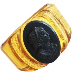 Vintage Rare Art Deco black and applejuice bakelite Cameo hinged bracelet clamper