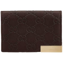 Gucci Brown Embossed Leather GG Wallet 2