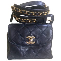 Vintage CHANEL black leather waist purse, fanny bag with golden chain belt, CC
