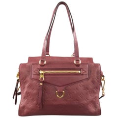 LOUIS VUITTON Burgundy Monogram Embossed Leather 'Lumineuse' Handbag