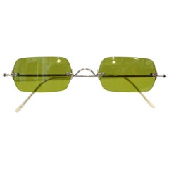 Lunettes de soleil Oliver Peoples à verre vert olive