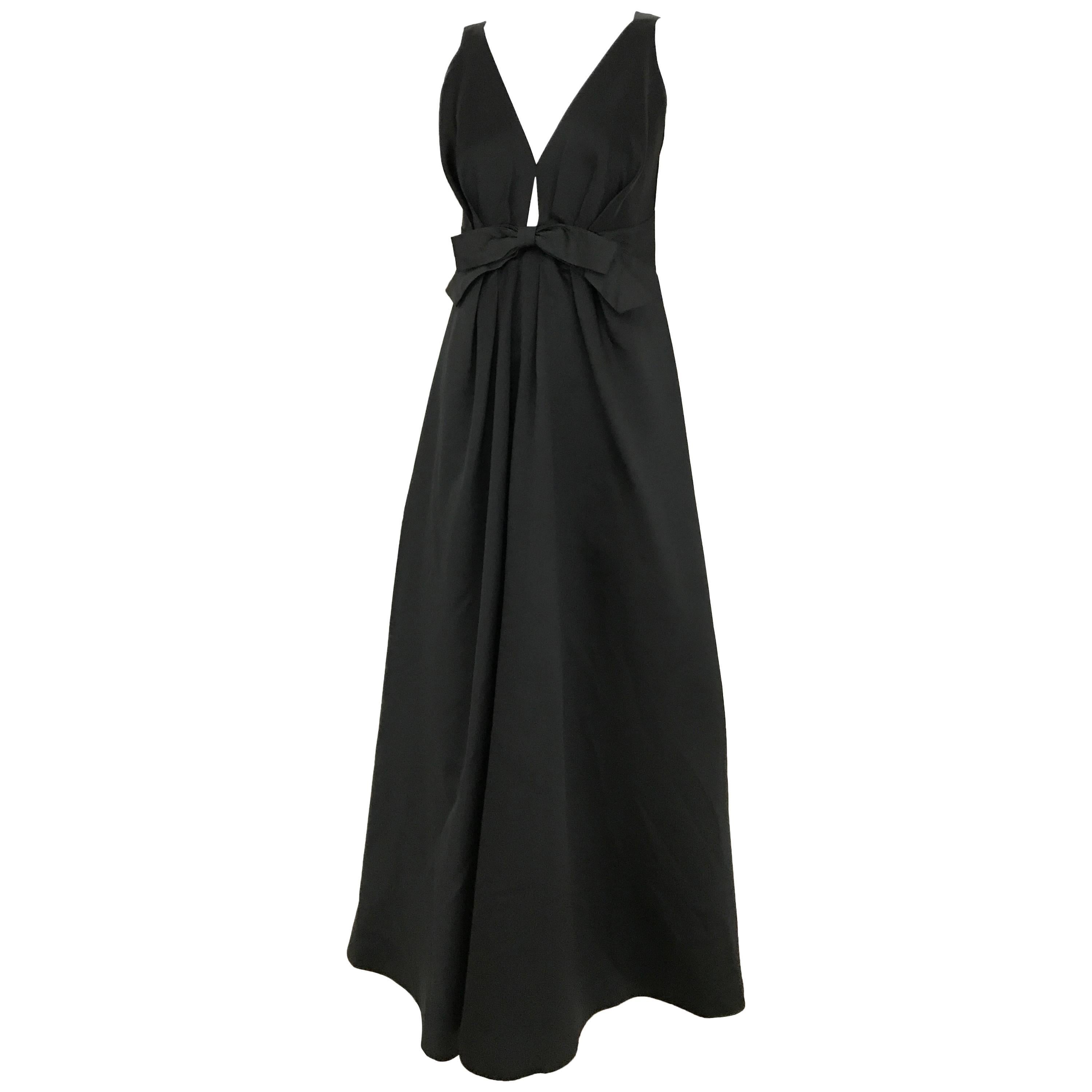Elegant 1960s Adelle Ross Black Silk V neck Gown with bow
