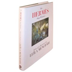 das Buch "Die Hermes-Schaufenster" mit der Kunst von Leila Menchari