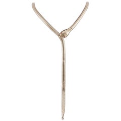 Very long brass "Snake" necklace, 1930s