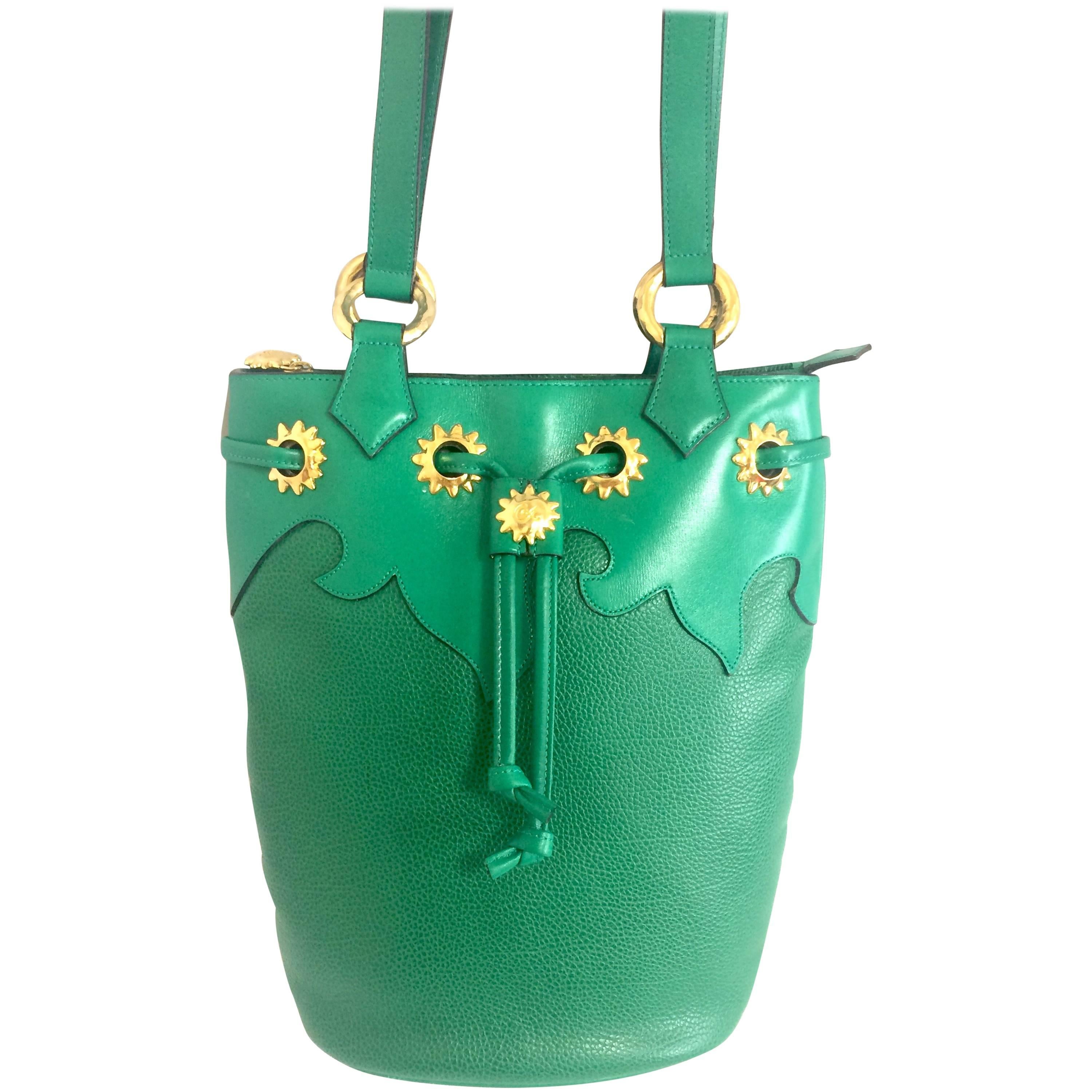 Vintage Christian Lacroix green hobo bucket shoulder bag with golden star motifs