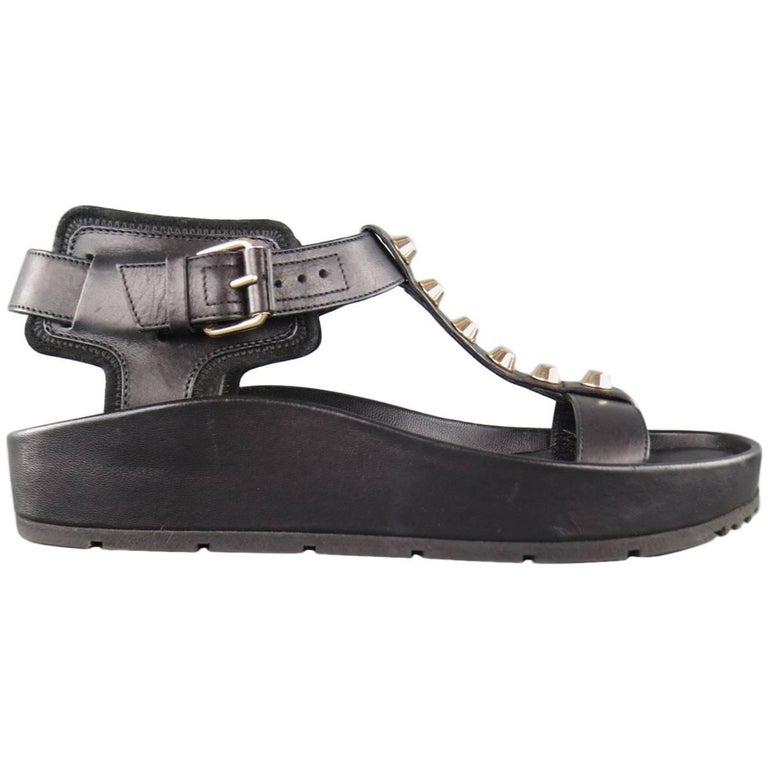 BALENCIAGA Size 7 Black Leather Studded T Strap Flat Sandals at 1stDibs