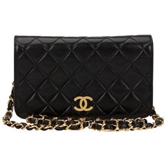 1990s Chanel Black Quilted Lambskin Vintage Mini Flap Bag