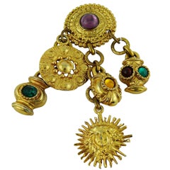 Edouard Rambaud Broche vintage à plusieurs breloques ornées de bijoux