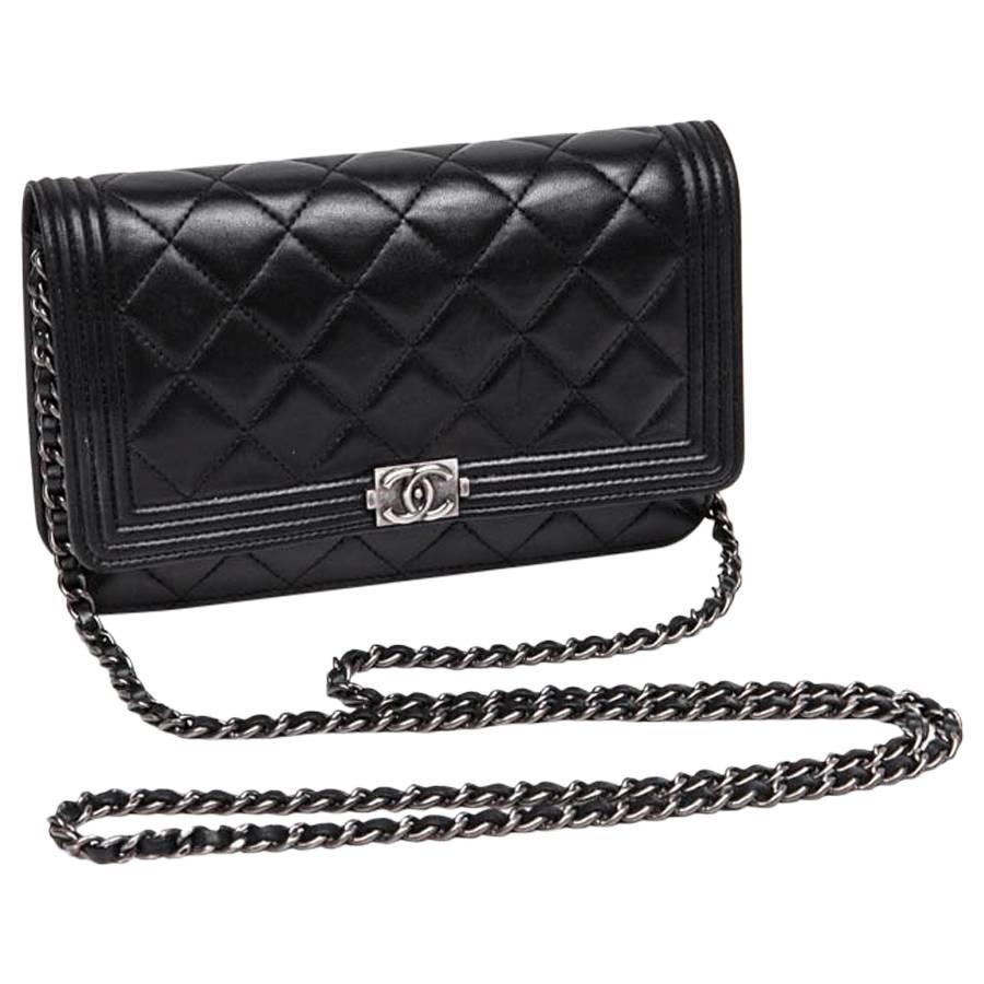 Mini CHANEL Flap Bag in Black Quilted Lamb Leather