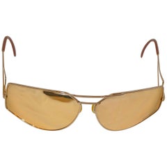 Vintage Silhouette Gold Hardware Accented with Gold Mirror Sunglasses