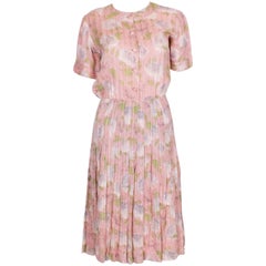 A Vintage 1940s floral print, pink summer cotton day dress