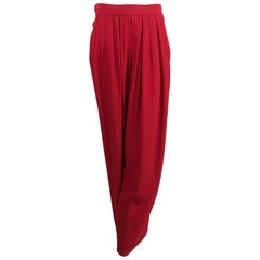 Vintage Yves Saint Laurent candy red satin back crepe full leg trousers 1990s