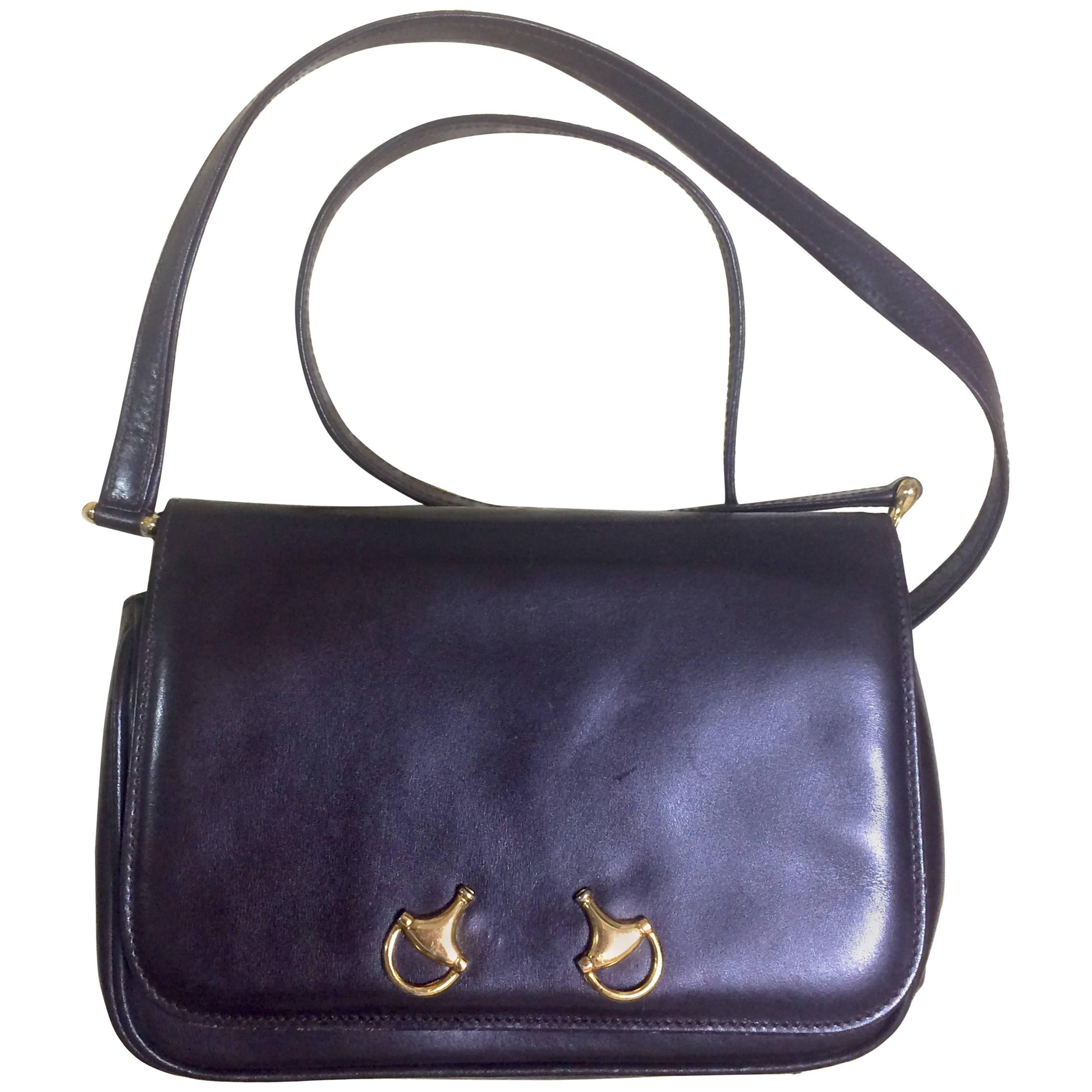 Vintage Gucci dark brown leather classic shoulder bag with 2 horsebit motifs.
