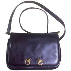 Retro Gucci dark brown leather classic shoulder bag with 2 horsebit motifs.