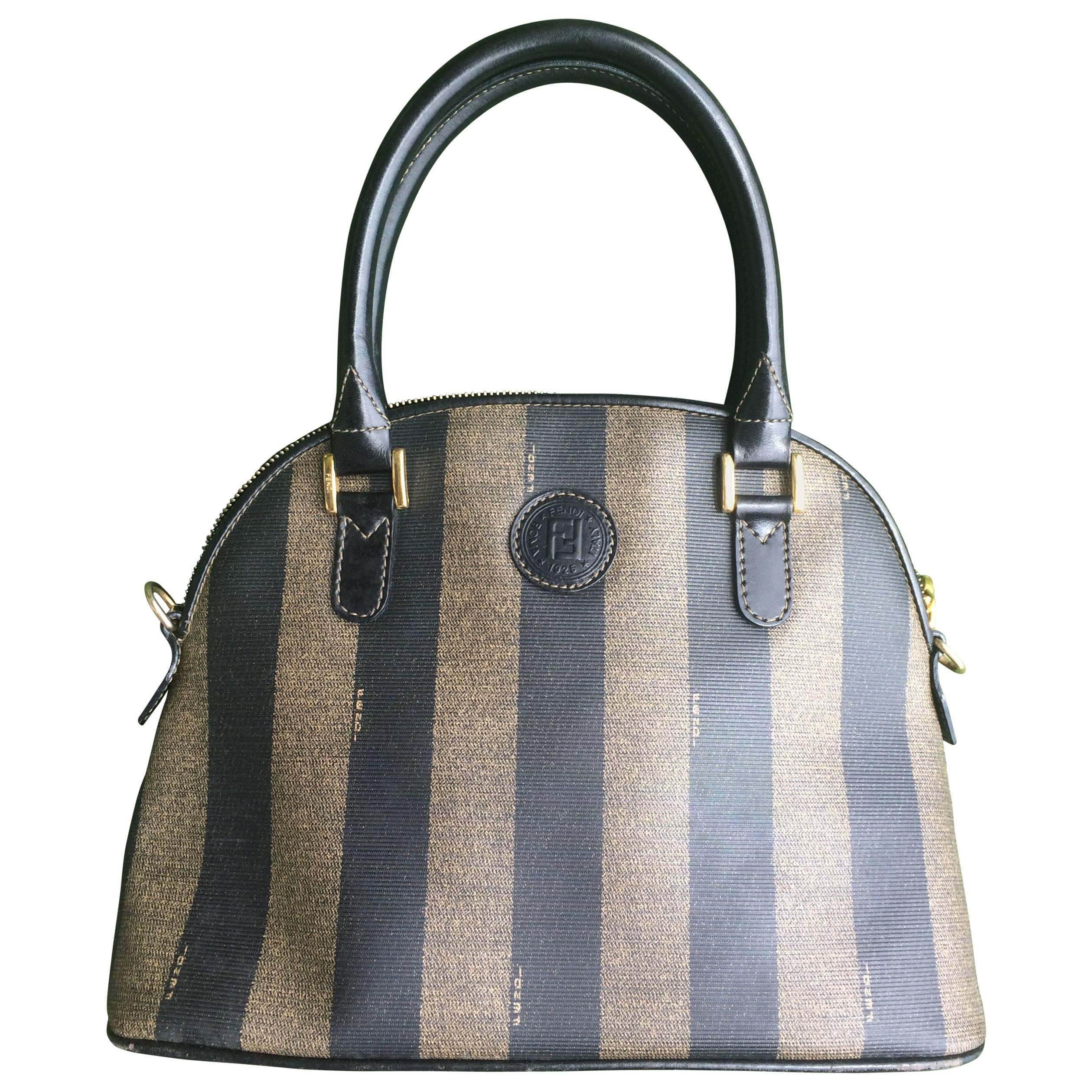 Vintage FENDI classic black and grey pecan vertical stripe bolide shape handbag.