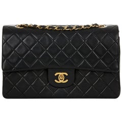 1990s Chanel Black Quilted Lambskin Vintage Medium Classic Double Flap Bag 1990s Chanel Black Quilted Lambskin Vintage Medium Classic Double Flap Bag