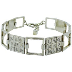 Vintage Karl Lagerfeld Necklaces 41 For At 1stdibs Karl Lagerfeld Vintage Silver Toned Crossword Puzzle Choker Necklace