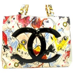 Vintage CHANEL vinyl shoulder bag with red, yellow, blue graffiti design with CC