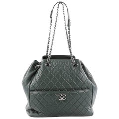 Chanel Drawstring CC Lock Bucket Bag Quilted Lambskin Medium