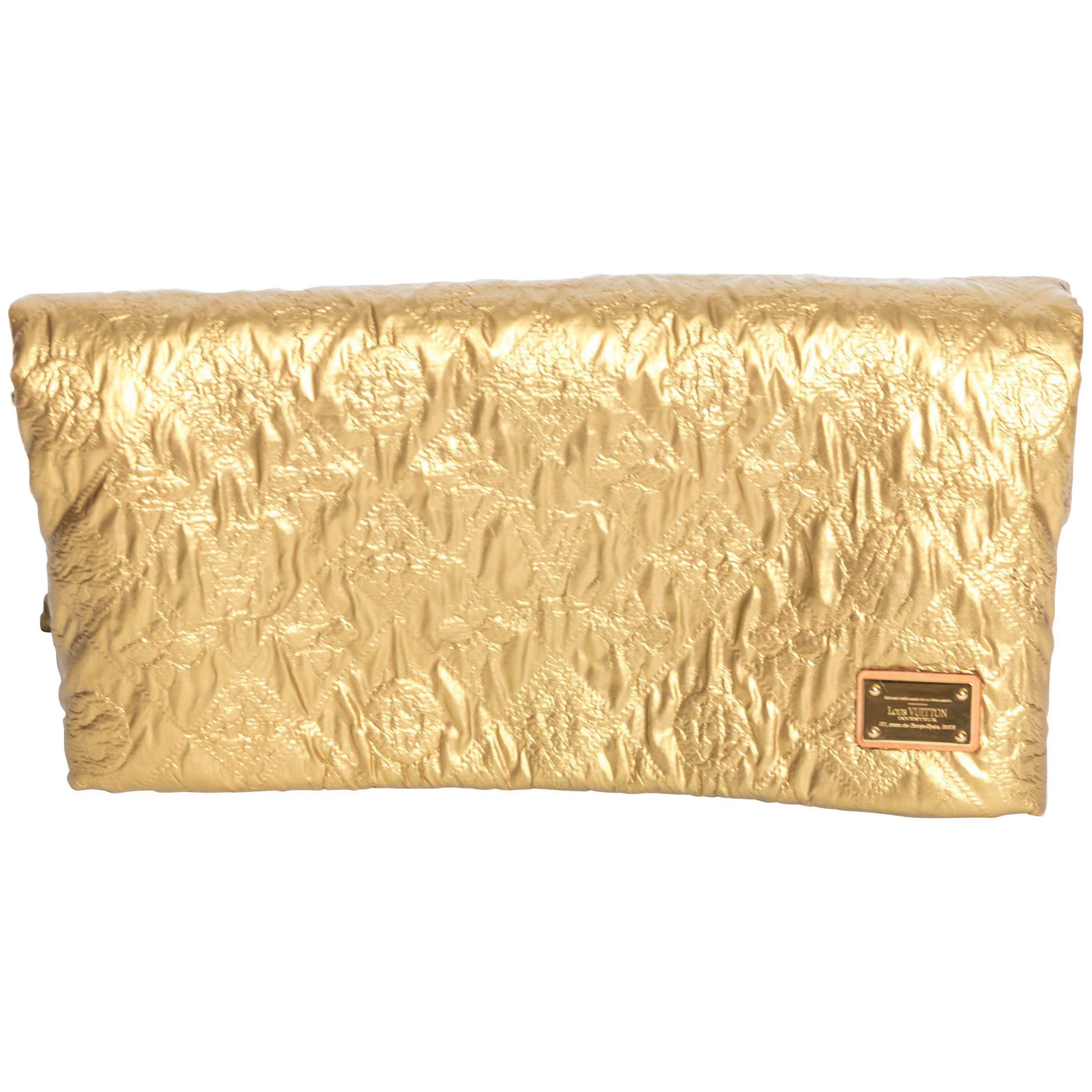 Louis Vuitton Gold Limelight Clutch