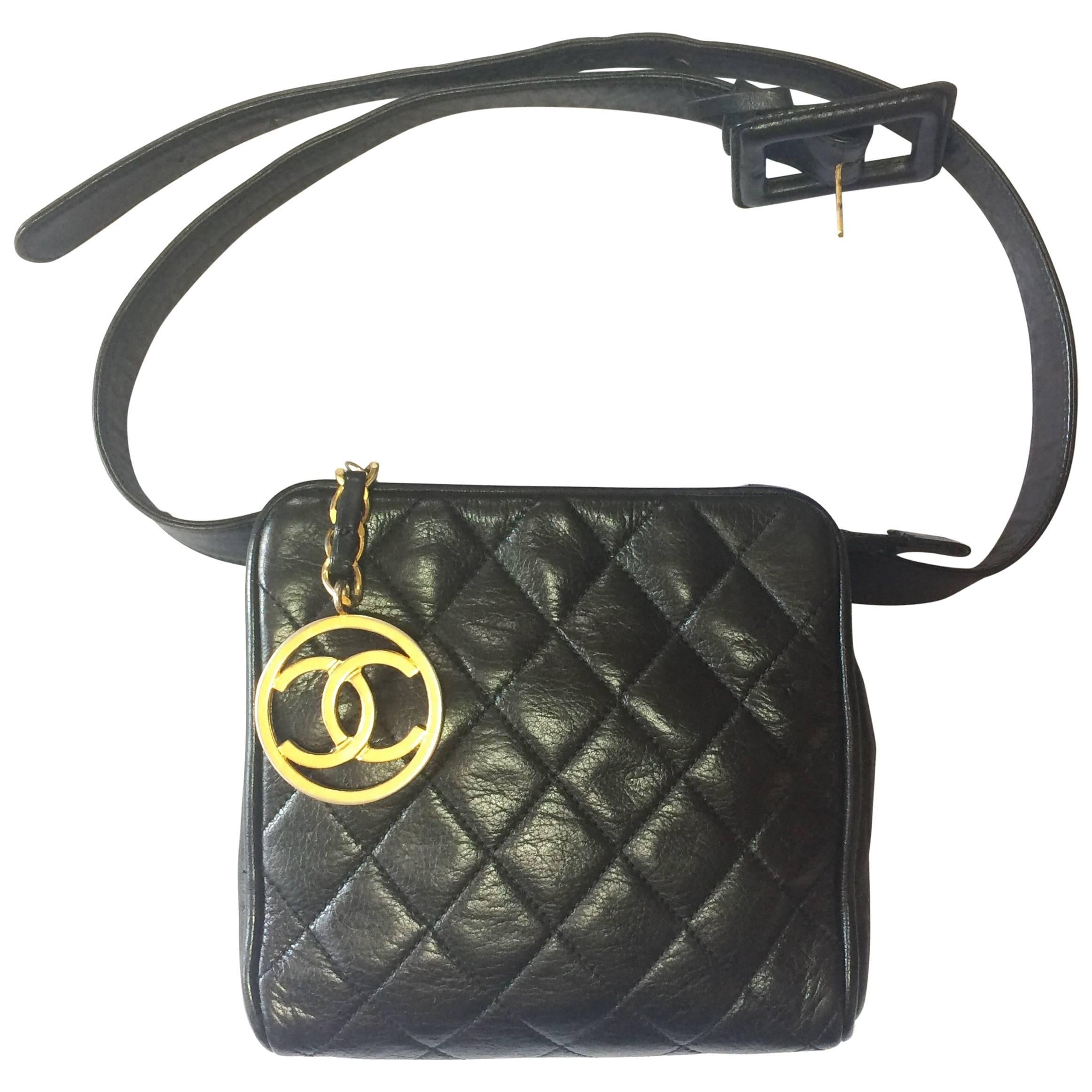 Vintage CHANEL black lambskin square shape fanny pack with golden round CC motif For Sale