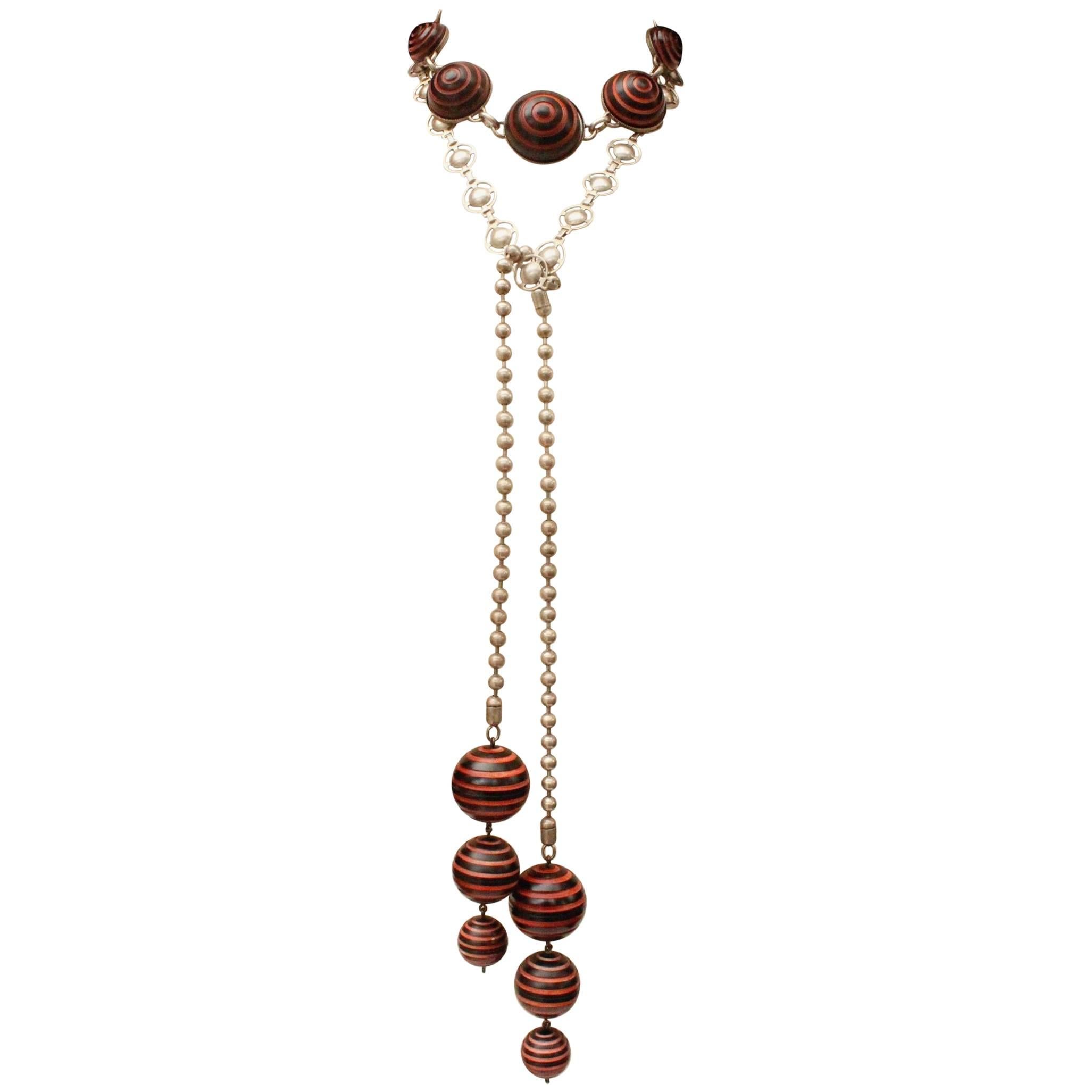 1990s, Jean-Paul Gaultier long tie-necklace with black and orange spheres For Sale