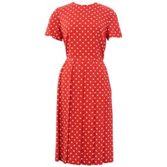 2014 Comme des Garcons polka dot red apron dress.