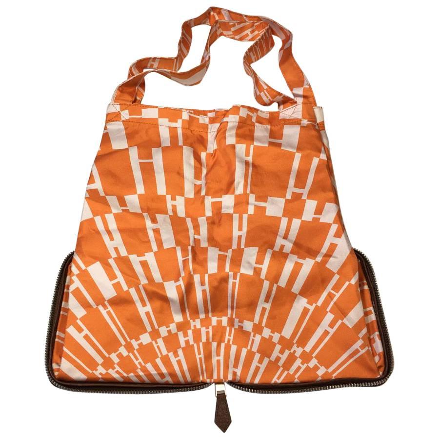 HERMES Foldable Silky Pop Bag in Brown Leather and Orange Silk
