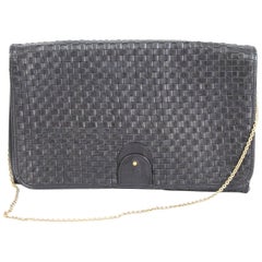 Errico Coveri women
s leather black shoulder bag gold chain 1980s made italy