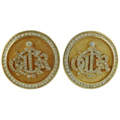 Boucles d'oreilles à clip avec logo en diamants Christian Dior Vintage