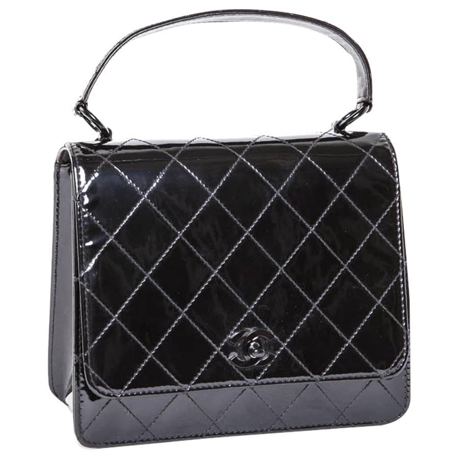 Vintage CHANEL Flap Bag in Black Patent Leather with Quilted Stitching