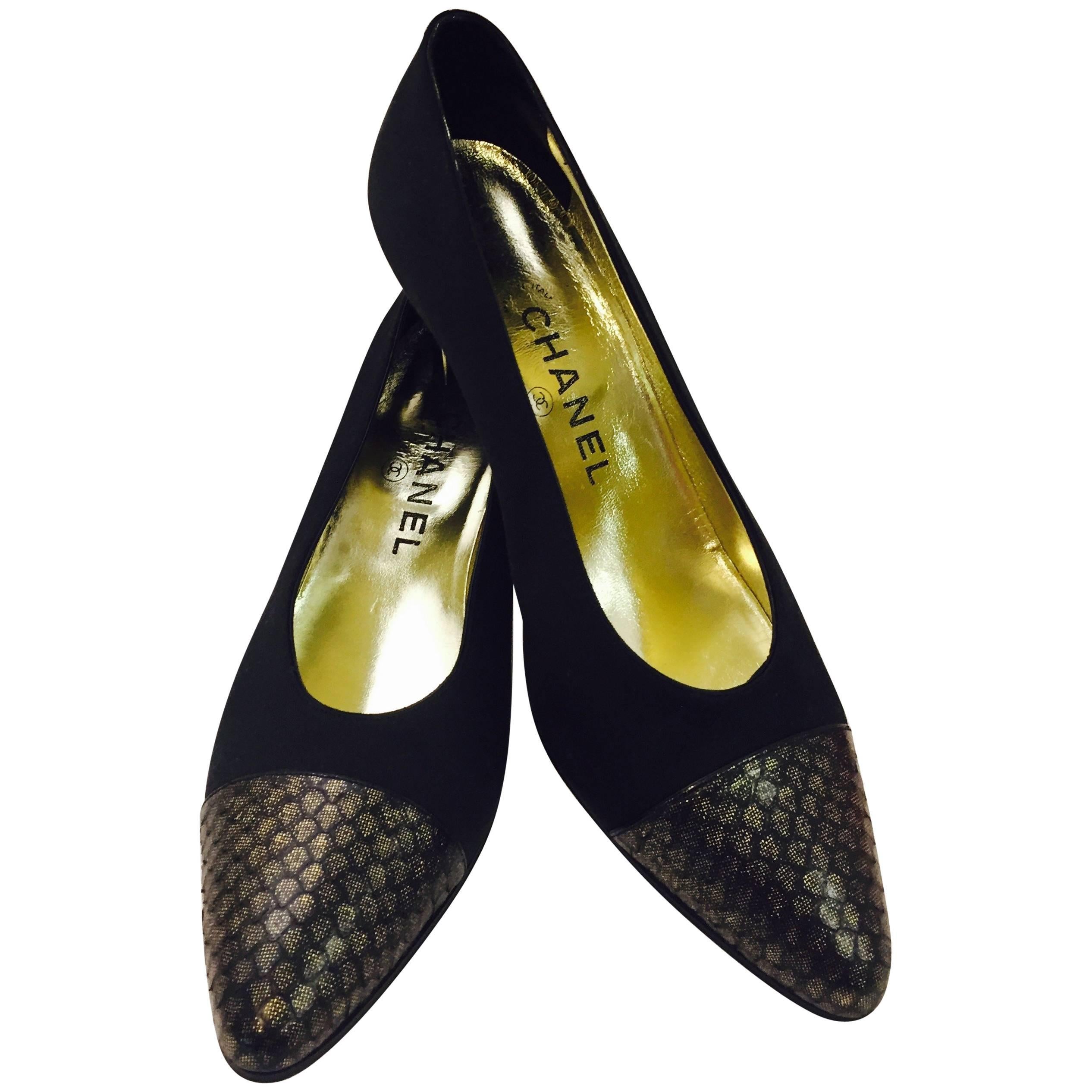 Charismatic Chanel's Black Satin Pumps With Cap Toe in Gold and Black