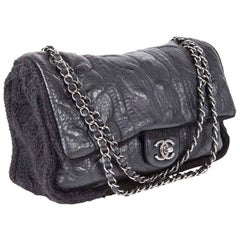 CHANEL Flap Bag in Black Wool and Aged Leather