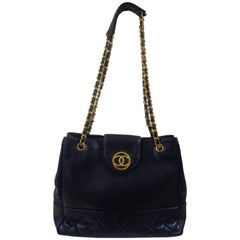 90
 Chanel blue leather gold tone hardware shoulder bag