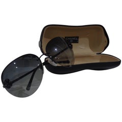 Chanel black camelia sunglasses with box