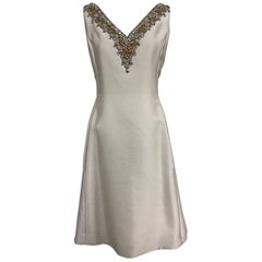 Vintage Malcolm Starr jeweled V neck lustrous cream silk dress 1960s