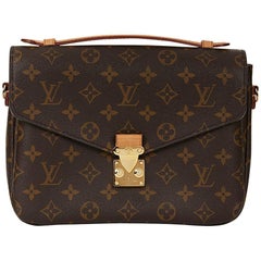 Used 2016 Louis Vuitton Brown Monogram Coated Canvas Pochette Metis