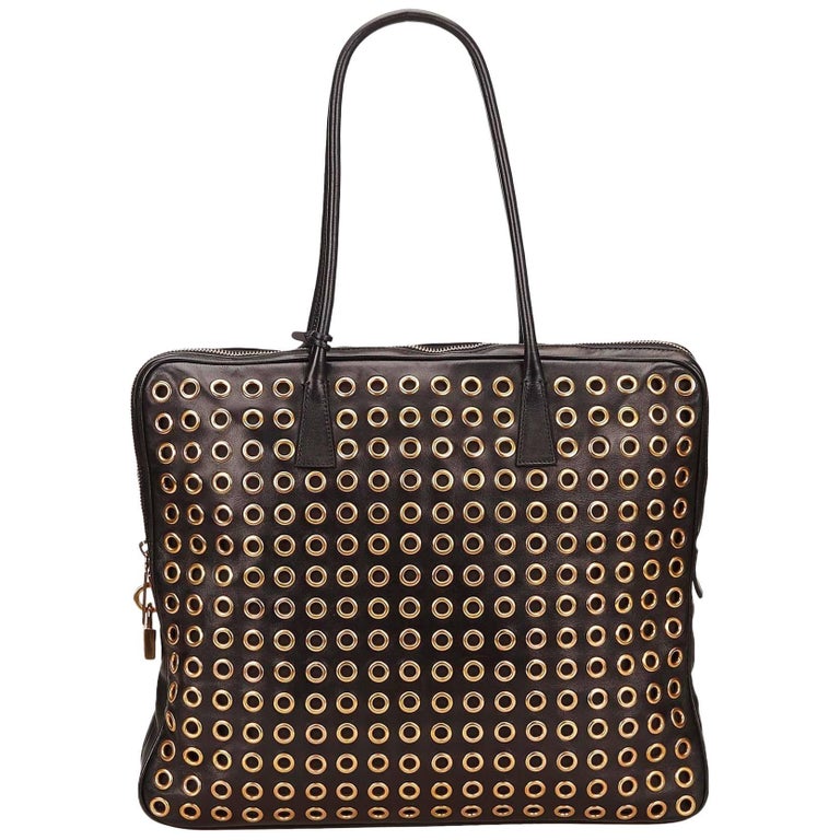 Prada Black Leather Gold Toned Eyelet Handbag at 1stDibs