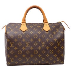 Louis Vuitton Speedy 30 Monogram Canvas City Hand Bag