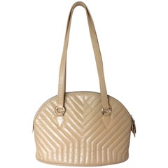 Vintage Yves Saint Laurent beige bolide shape shoulder bag. Y, Chevron stitches