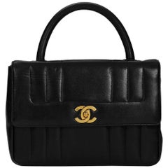 1990s Chanel Black Vertical Quilted Lambskin Retro Timeless Kelly