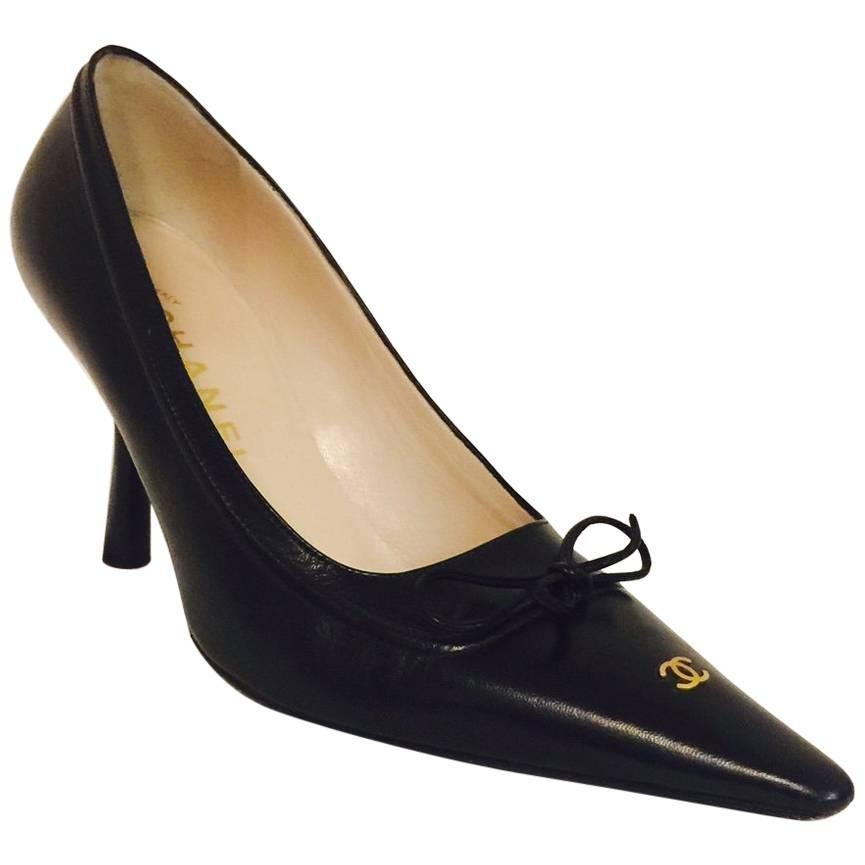 Classic Chanel Black Pointed Toe Pumps With Leather Ties