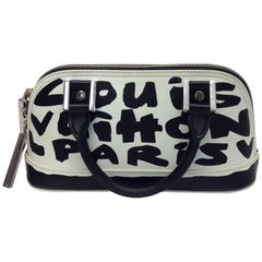 Louis Vuitton x Stephen Sprouse Graffiti Alma MM (SHG-YwHR0E) – LuxeDH