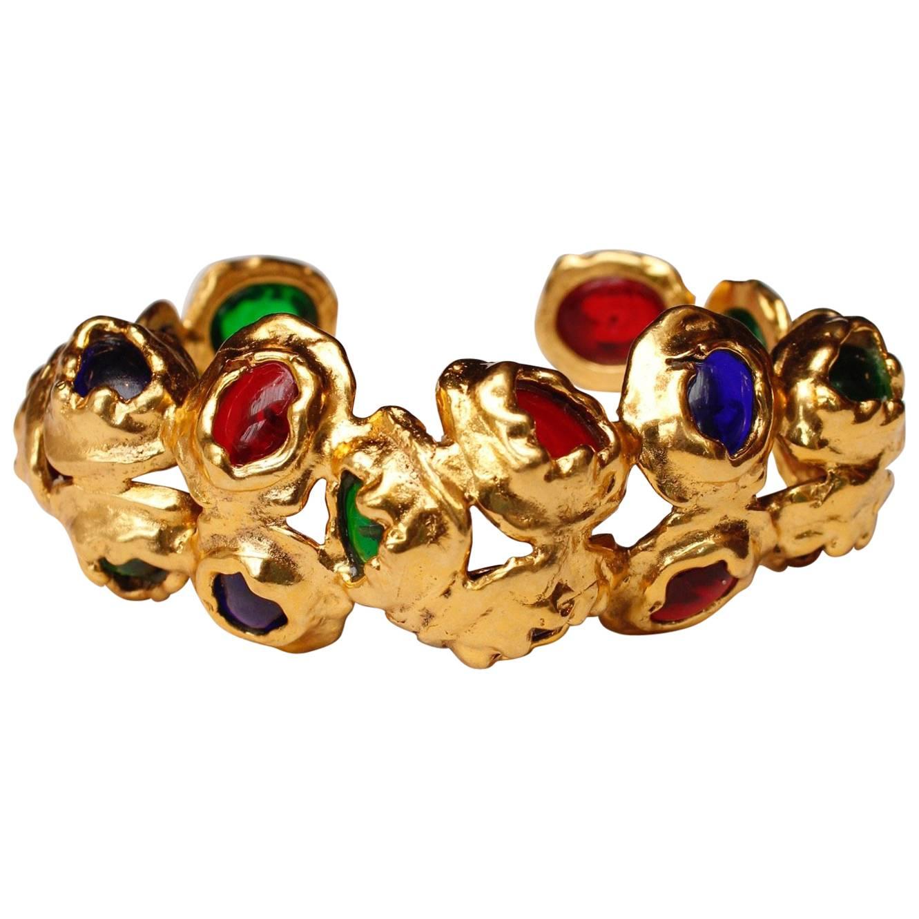 1990s, Chanel gilded metal bangle with glass paste cabochons For Sale