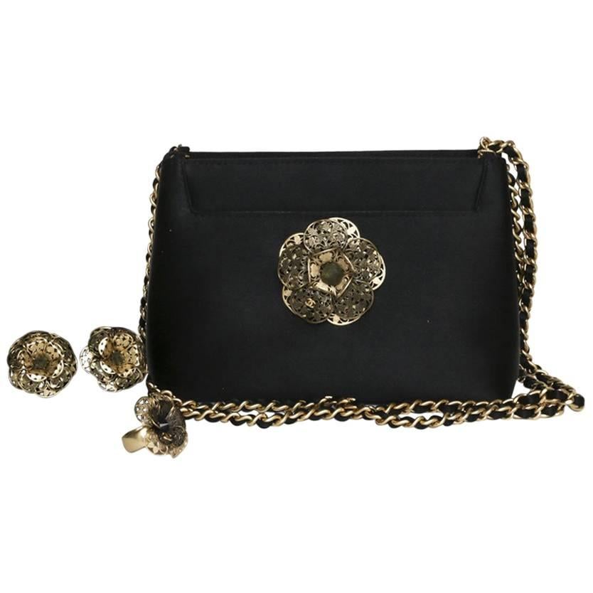 CHANEL Set : Evening Bag in Black Satin, Gilded Metal Clip-on Earrings and  Ring