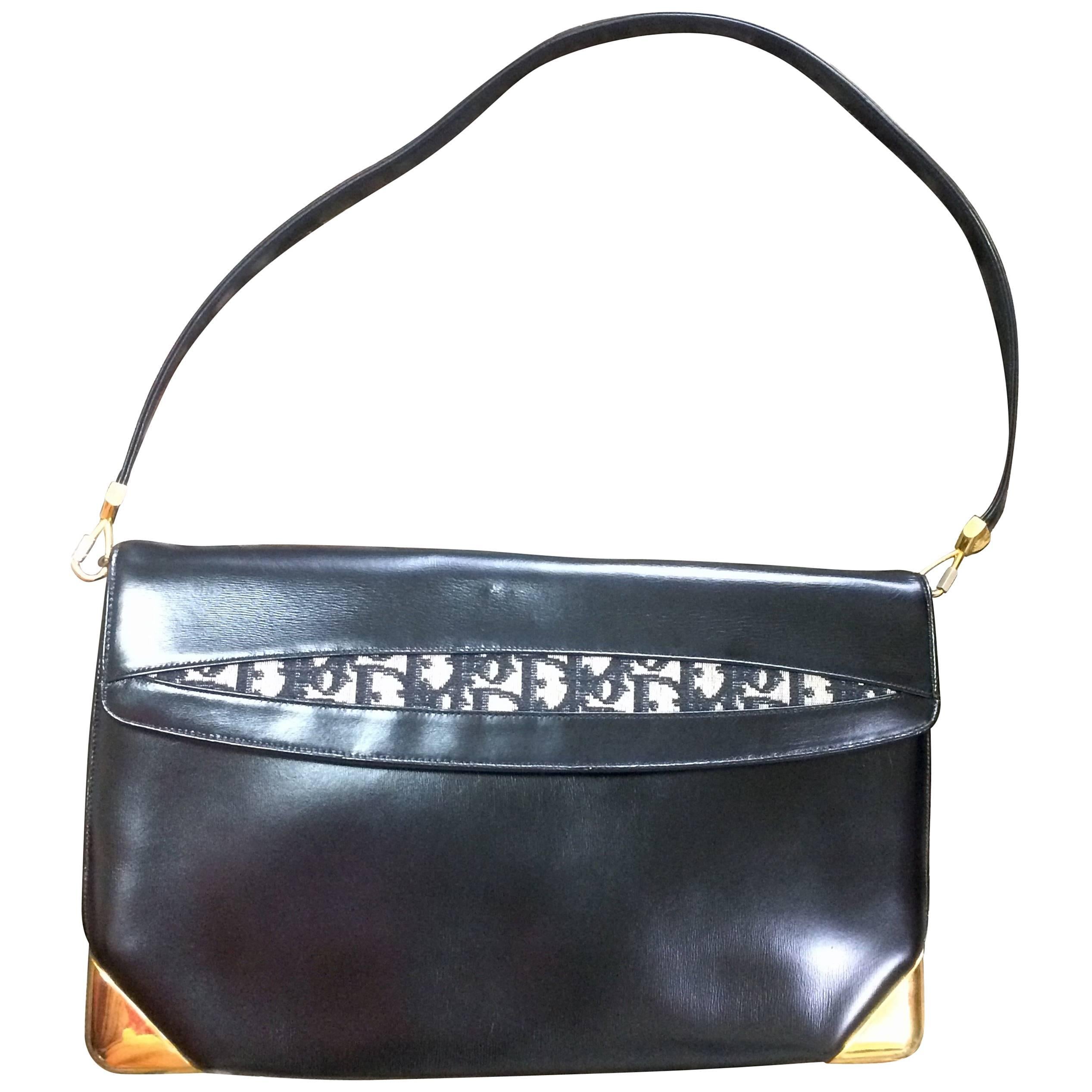 Vintage Christian Dior black leather large clutch, shoulder bag with trotter.