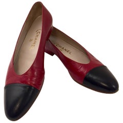 Chanel Classic Red Flats With Black Cap Toes 