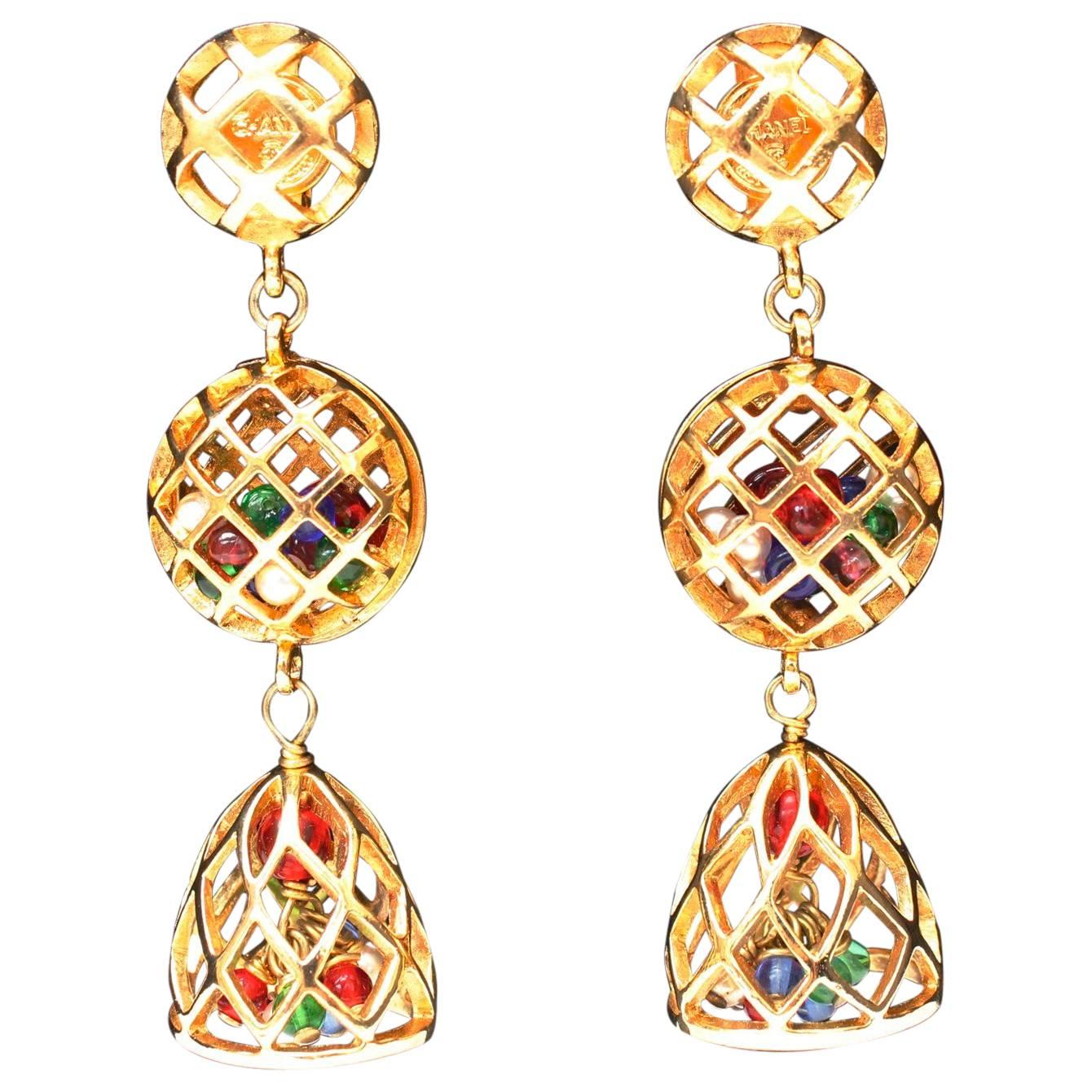 1980s Chanel clip-on earrings representing gilded metal cages