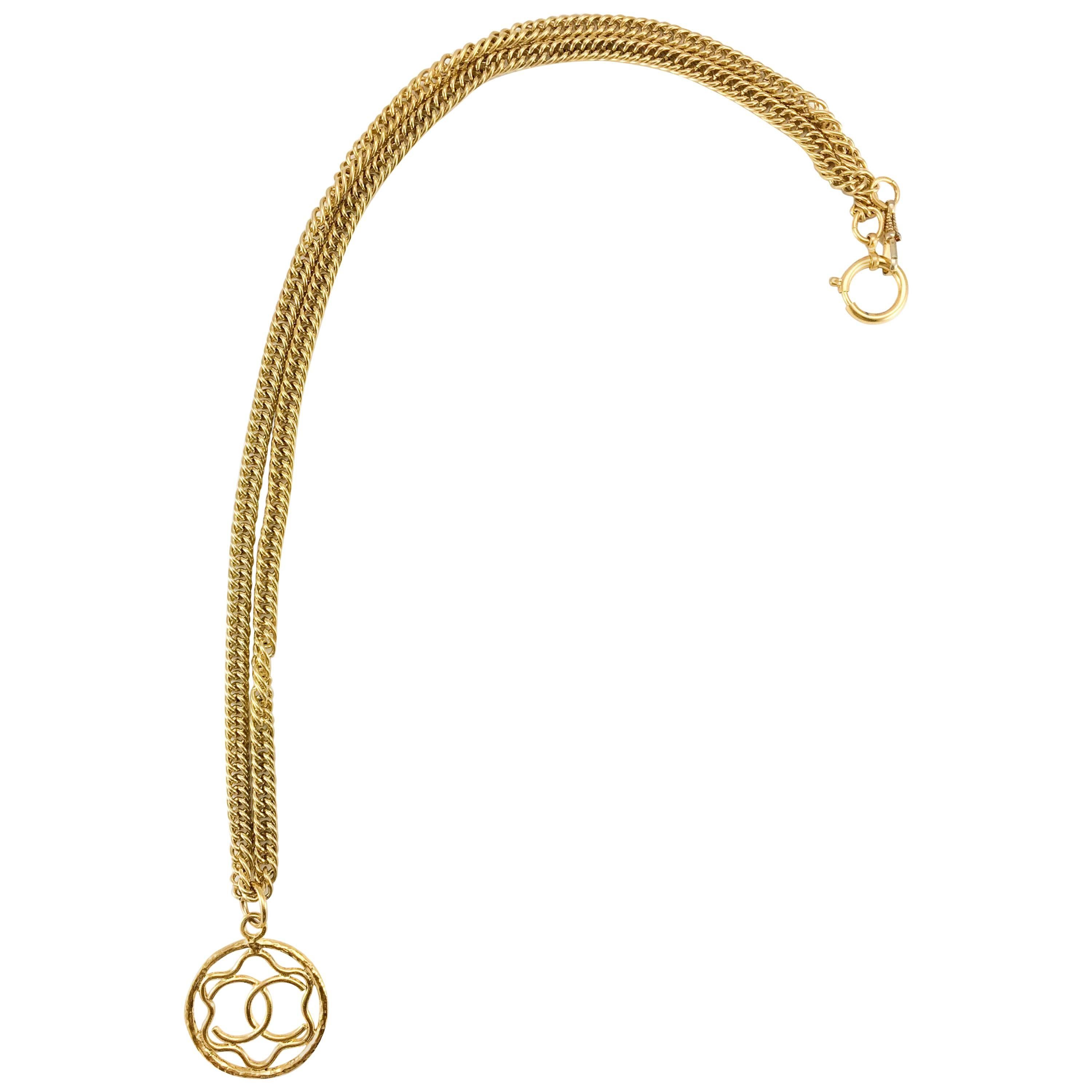 1980s Chanel Gilt Logo Medallion Pendant Long Chain Necklace For Sale