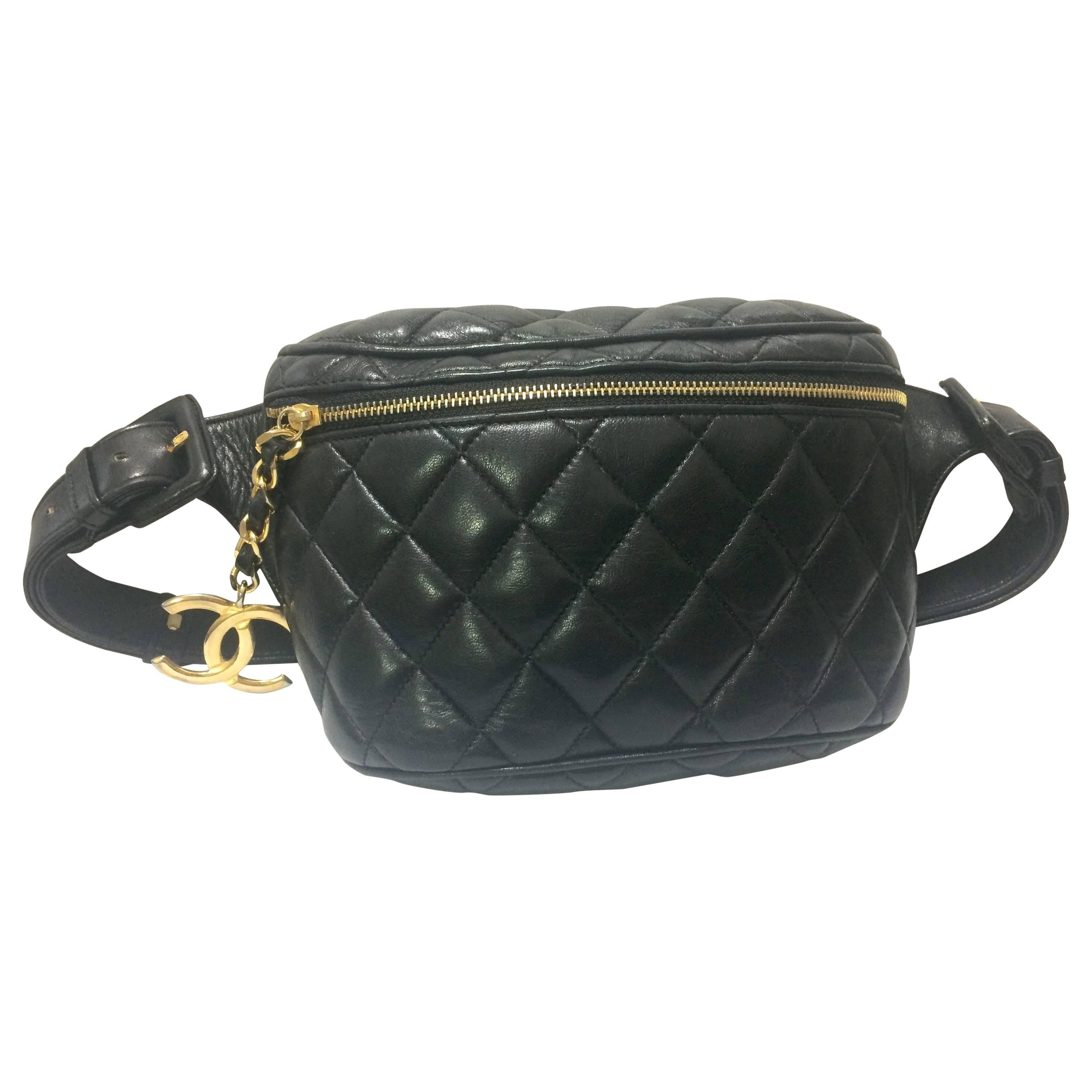 Vintage CHANEL black leather waist bag, fanny pack with belt and golden CC motif